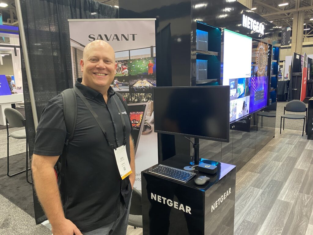 CEDIA news. This image show Domotz network monitoring hardware box on the NETGEAR booth during CEDIA 2022.